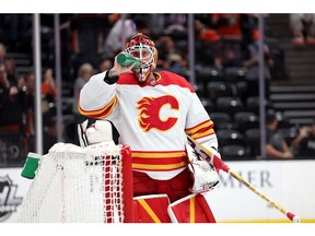 Jacob Markstrom #25 of the Calgary Flames looks on after a goal by Adam Henrique #14 of the Anaheim Ducks during the third period of a game at Honda Center on April 06, 2022 in Anaheim, California.