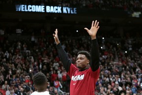 Miami Heat guard Kyle Lowry acknowledges the crowd prior to facing his former team, the Raptors, in Toronto on Sunday, April 3, 2022.