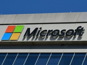 In this file photo a Microsoft logo adorns a building in Chevy Chase, Md, May 19, 2021.