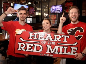 Preparations for the Flames playoff run are already underway at Trolley 5 on 17th Avenue S.W. Staff members Kyle Szoo, Maria Bravo and Drew Dougherty pose for a photo inside the brewery on April 17, 2022.
