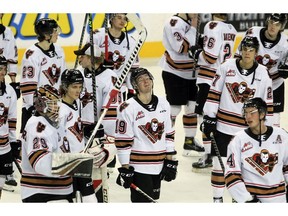 The Calgary Hitmen salute their fans after the third period of action as the Calgary Hitmen lost to the visiting Lethbridge Hurricanes 3-2 in overtime at the Saddledome for their last game of the season. April 17, 2022. Brendan Miller/Postmedia