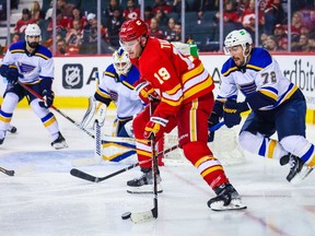 Calgary Flames forward Matthew Tkachuk controls the puck against the St. Louis Blues at Scotiabank Saddledome in Calgary on Saturday April 2, 2022.