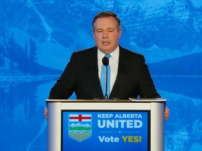 Premier Jason Kenney speaks to United Conservative Party members at the party's special general meeting in Red Deer on Saturday, April 9, 2022.