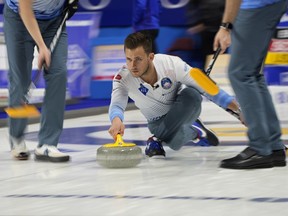 United States skip Korea Dropkin delivers a rock against Scotland during the LGT World Men's Curling Championship at Orleans Arena in Las Vegas on Tuesday, April 5, 2022.