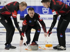 Canada skip Brad Gushue delivers a stone for sweepers Geoff Walker and Brent Gallant against the Czech Republic during the LGT World Men’s Curling Championship at Orleans Arena in Las Vegas on Saturday, April 2, 2022. Canada won 6-4.