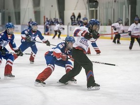 Shaundra Bruvall, pictured taking a shot, leads the Calgary RATH as they attempt to defend their title at the 2022 Canadian Ringette Championships in Calgary.