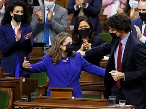 Finance Minister Chrystia Freeland hugs Prime Minister Justin Trudeau after delivering the 2022-23 budget in the House of Commons on Parliament Hill in Ottawa in this photo from April 7.
