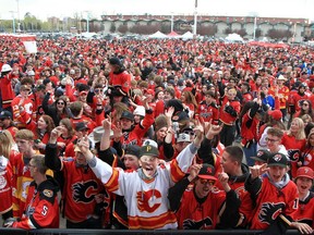 Flames fans celebrate at the Red Lot viewing party ahead of Game 6 between the Calgary Flames at Dallas Stars. Friday, May 13, 2022. Brendan Miller/Postmedia