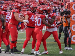 The Calgary Stampeders celebrate a touchdown by Rasheed Tucker against the BC Lions during a pre-season game at McMahon Stadium on Saturday, May 28, 2022. The Stampeders won 41-6.