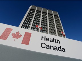 A sign is displayed in front of Health Canada headquarters in Ottawa on Friday, January 3, 2014.