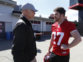 Linebacker Josiah Schakel chats with Tom Higgins after Schakel?s first day at Calgary Stampeders? rookie camp practice in Calgary Wednesday, May 11, 2022.