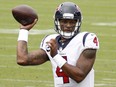 Quarterback Deshaun Watson of the Houston Texans passes against the Tennessee Titans at Nissan Stadium on October 18, 2020 in Nashville, Tennessee.