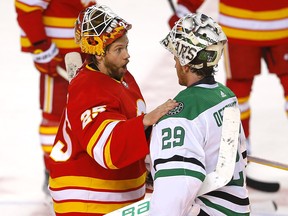 Flames goaltender Jacob Markstrom shakes hands with Dallas Stars goaltender after Sunday's overtime win.