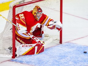 Calgary Flames goaltender Jacob Markstrom (25) guards his net against the Dallas Stars during the second period in Game 1 of the first round of the 2022 Stanley Cup Playoffs at Scotiabank Saddledome on May 3, 2022.