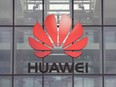 The Huawei logo is pictured on the headquarters building in Reading, England, July 14, 2020.