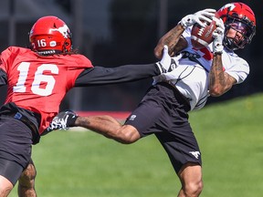 The Calgary Stampeders have suspended Brendan Langley, right, indefinitely after an altercation with a United Airlines worker at Newark Liberty International Airport last week.