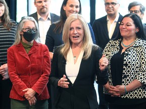 NDP Leader Rachel Notley speaks to reporters at a press conference while surrounded by other NDP MLA candidates at the cSpace theatre in the SW. Thursday, May 19, 2022.