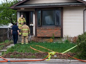 Firefighters remained on the scene of a home on the 100 block of Deerview Way southeast on Wednesday morning, May 18, 2022 that was the scene of a fatal fire late Tuesday night. One man died in the fire.
Gavin Young/Postmedia