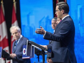 Conservative leadership candidates Leslyn Lewis, Roman Baber, Jean Charest, Scott Aitchison, Patrick Brown and Pierre Poilievre, take part in the Conservative Party of Canada English leadership debate on Wednesday, May 11, 2022 in Edmonton.