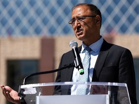 Mayor Amarjeet Sohi announces changes the city has made to address the police act invoked by the provincial government regarding violence in the inner city during a press conference outside city hall in Edmonton, on Monday, May 30, 2022.
