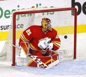 Jacob Markstrom gives up a goal by Oilers Zach Hyman in the second period.
