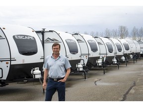 Bucars RV Centre general manager Jeff Redmond with new recreational vehicles on his lot in Balzac, Alta., Tuesday, May 17, 2022.