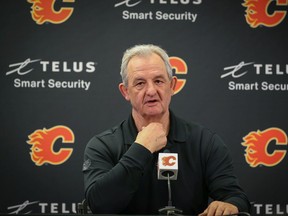 Calgary Flames head coach Darryl Sutter talks with media.