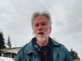Calgary police are looking for this suspect whom they allege assaulted a man and his service dog in the community of Thorncliffe on Jan. 13, 2022.