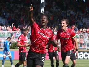 Cavalry FC’s Aribim People celebrates one of his two goals against FC Edmonton on ATCO Field at Spruce Meadows on Sunday, June 26, 2022.