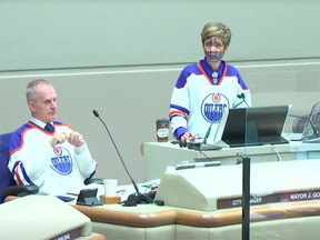Tuesday's meeting of Calgary city council was a sea of orange and blue, as councillors flooded chambers wearing Edmonton Oilers colours.