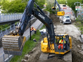 Memorial Drive was shut down between 3str. and 10str. N.W. as City crews removed the berm after flood fears evaporated in Calgary on Saturday, June 18, 2022. Darren Makowichuk/Postmedia