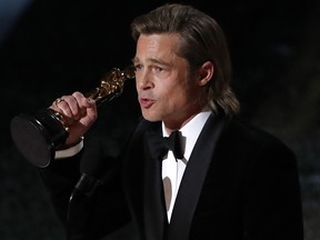 Brad Pitt accepts the Oscar for Best Supporting Actor for "Once Upon a Time in Hollywood" at the 92nd Academy Awards in Hollywood Feb. 9, 2020.