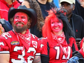 Fans enjoy a game between the Calgary Stampeders and the BC Lions at McMahon Stadium in 2017.