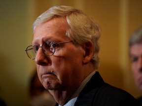 U.S. Senate Minority Leader Mitch McConnell (R-KY) listens during a press conference following the Senate Republicans weekly policy lunch at the U.S. Capitol in Washington, June 22, 2022.