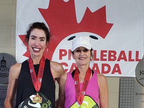 Calgary's Andrea Seels and Kim Rahme receive their gold medals for winning the women's doubles skill (3.0-) Age 50-57 category at the 2022 Canadian National Pickleball Championships last week (June 20-26) in Kingston, Ont.