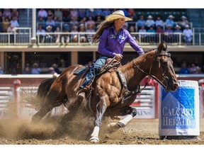 Kassie Mowry wins the day in barrel-racing at the Calgary Stampede rodeo on Wednesday.