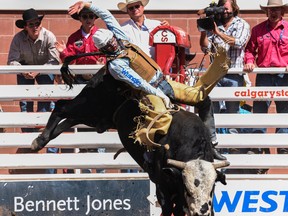 Creek Young, from Rogersville, Mo., topped the bull-riding event on Day 6 of Calgary Stampede rodeo on Wednesday.