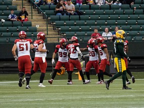 The Calgary Stampeders celebrate a touchdown by receiver Malik Henry against the Edmonton Elks at Commonwealth Stadium in Edmonton on Thursday, July 7, 2022.