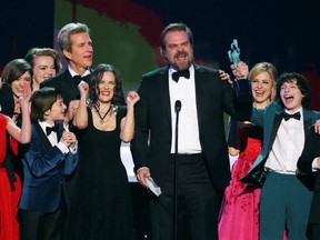 The cast of "Stranger Things" accepts their award for Ensemble in a Drama Series during the 23rd Screen Actors Guild Awards in Los Angeles, Jan. 29, 2017.