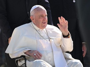 Pope Francis waves as he arrives at Lac Ste. Anne, northwest of Edmonton, Alberta, Canada, July 26, 2022.