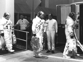 Buzz Aldrin, middle, leaving to go on Apollo 11 and fly to the moon.