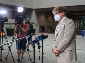 Calgary City Councillor Gian-Carlo Carra answers media questions outside council chambers on Tuesday, July 26, 2022. Gavin Young/Postmedia