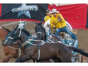 Chad Fike comes off the barrels at the Cowboys Rangeland Derby at the Calgary Stampede on Monday July 11.
