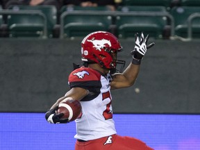 The Calgary Stampeders' Peyton Logan scores a touchdown against the Elks during second-half CFL action in Edmonton on Thursday July 7.