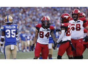 Calgary Stampeders' Reggie Begelton (84) celebrates his touchdown against the Winnipeg Blue Bombers during the first half of CFL action in Winnipeg, Friday, July 15, 2022.