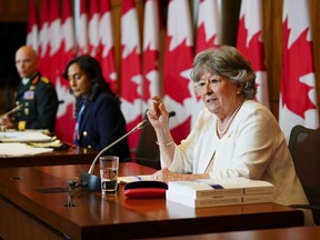 Former Supreme Court Justice Louise Arbour, and Minister of National Defence, Anita Anand, middle, release the final report of the Independent External Comprehensive Review into Sexual Misconduct and Sexual Harassment in the Department of National Defence and the Canadian Armed Forces in Ottawa on Monday, May 30, 2022.