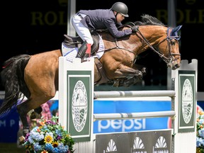 Jim Ifko rides Un Diamant des Forets to victory at Spruce Meadows on Thursday, July 7, 2022.