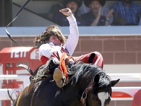 Rocker Steiner from Weatherford, Texas, rides Little Rotten during the bareback event on Day 5 of the Calgary Stampede Rodeo on Tuesday.