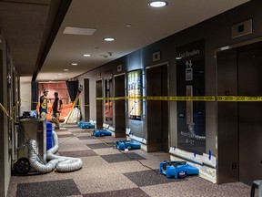 Repairs continued at the Calgary municipal building on Thursday, Aug. 4, 2022, after a man broke in and started several fires, setting off the sprinkler system.