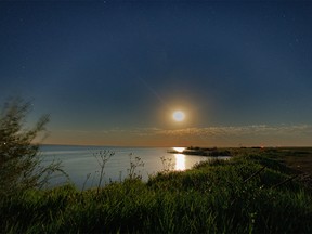 A faint moon-bow at McGregor Lake by Milo, Ab., on Monday, August 8, 2022.